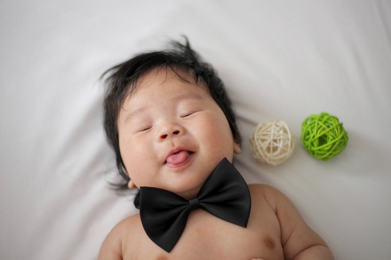 A Smiling Smart Sleeping Baby