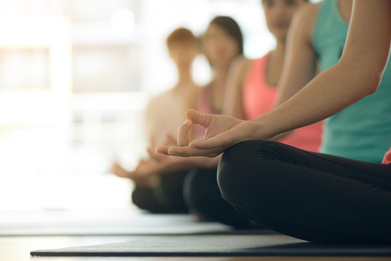 Pregnant mother doing yoga