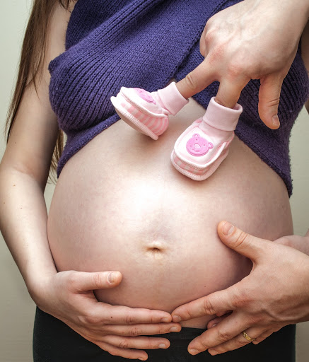 Baby kicks on mom's tummy